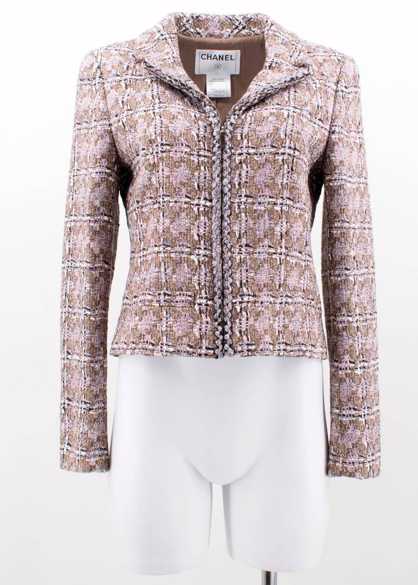 Chanel tweed wool blazer. 
Made in France. 

Features V- Neckline, collar and long sleeves. 
Includes zip fastening and zips on cuffs of sleeves. 
Includes padded shoulders and two front pockets. 

Fabric: 100% Cotton, 20% Silk, 7% Nylon, 6%