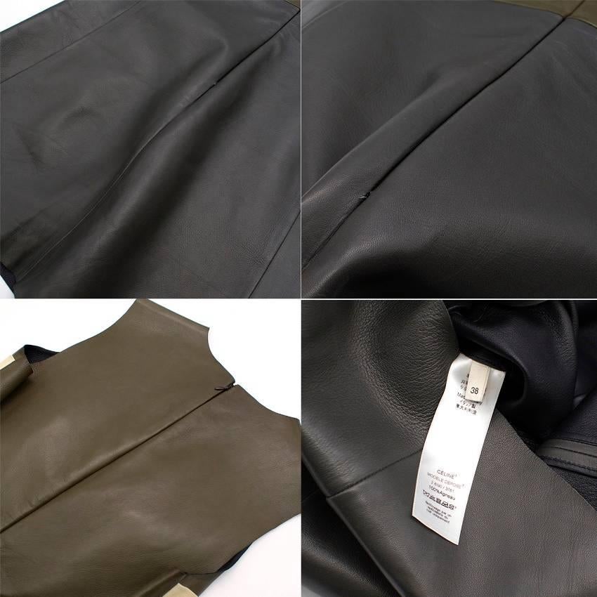 Celine Leather mid-length dress is tricolour, fitted, sleeveless and made of 100% lambskin leather. It features crew neck and back seam-covered zipper. Made in Italy.

Fabric: 100% lambskin

Great condition. 9 out of 10. maybe worn once. Hardly ever