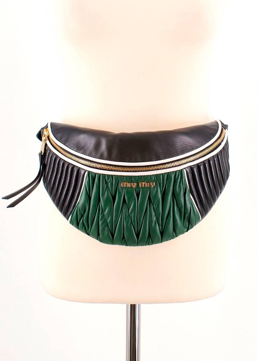 Miu Miu Matelasse Leather Belt Bag

- Current Season 2018
- Black and green panelled leather with white leather piping
- Gold-tone Miu Miu logo plaque to the front
- Gold-tone exposed zipper with Miu Miu embossed zip pills 
- Fully quilted design
-