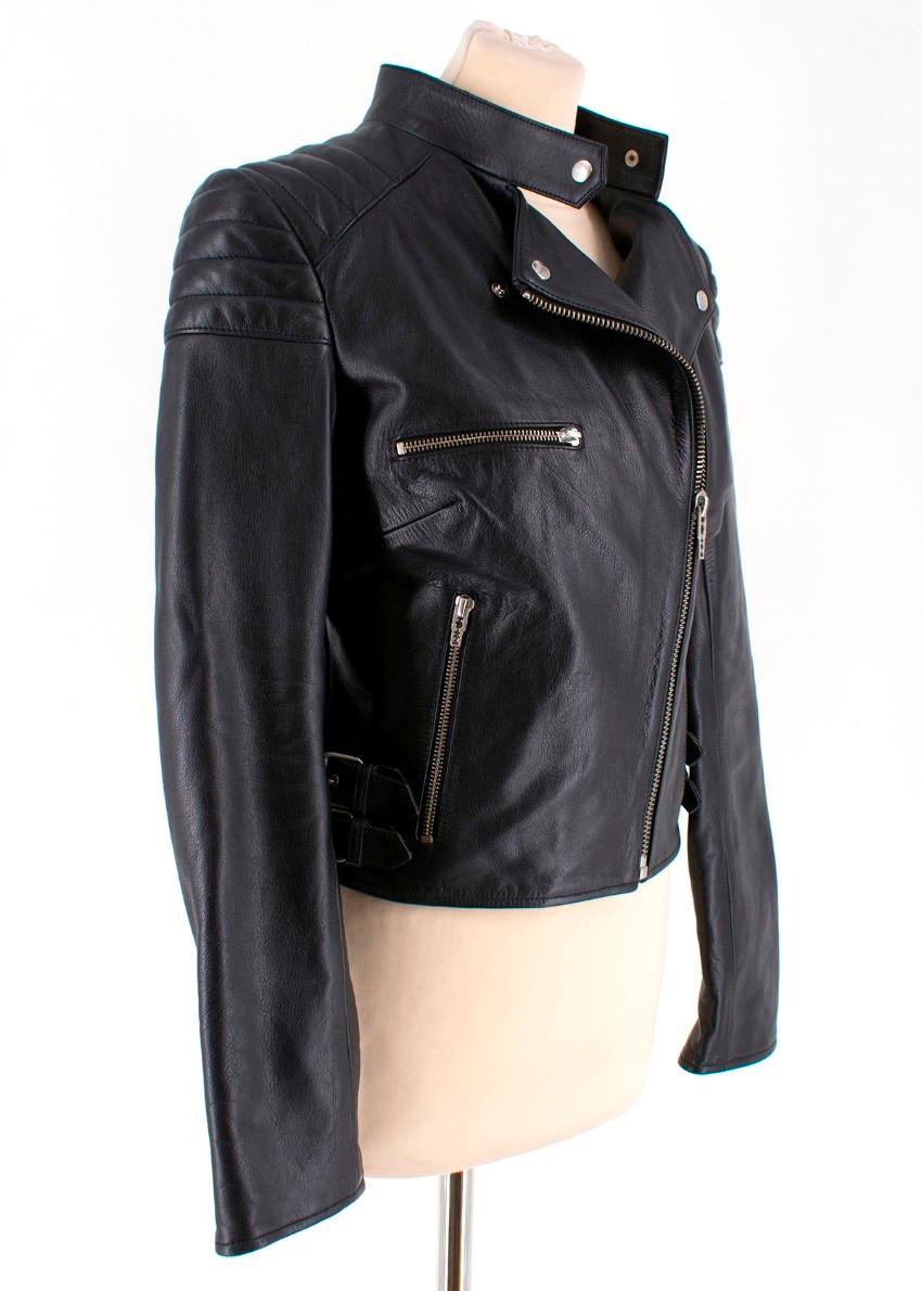 Alexander McQueen Black Leather Jacket

-Black leather jacket 
-Features side buckles
-Quilting on shoulders
-Tailored around bust
-Three pockets
-One internal pocket
-Silver toned zip closure

Please note, these items are pre-owned and may show