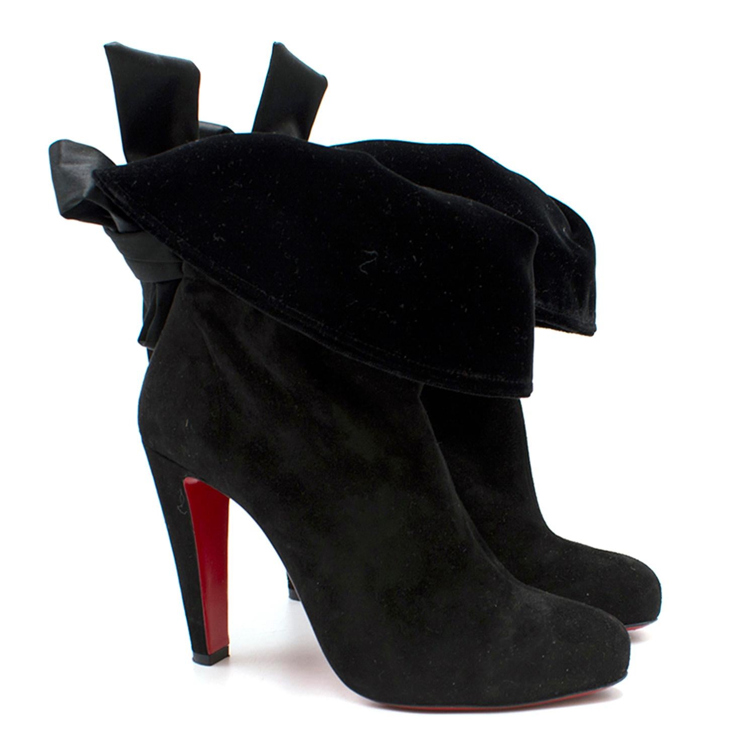 Christian Louboutin Kristofa 100 Suede Ankle Boots

- Current season
- Soft velvet cuff
- Elasticated ankle
- Large satin black ribbon fastening
- Rounded, pointed toe
- Iconic red Louboutin soles
- High heel

Please note, these items are pre-owned