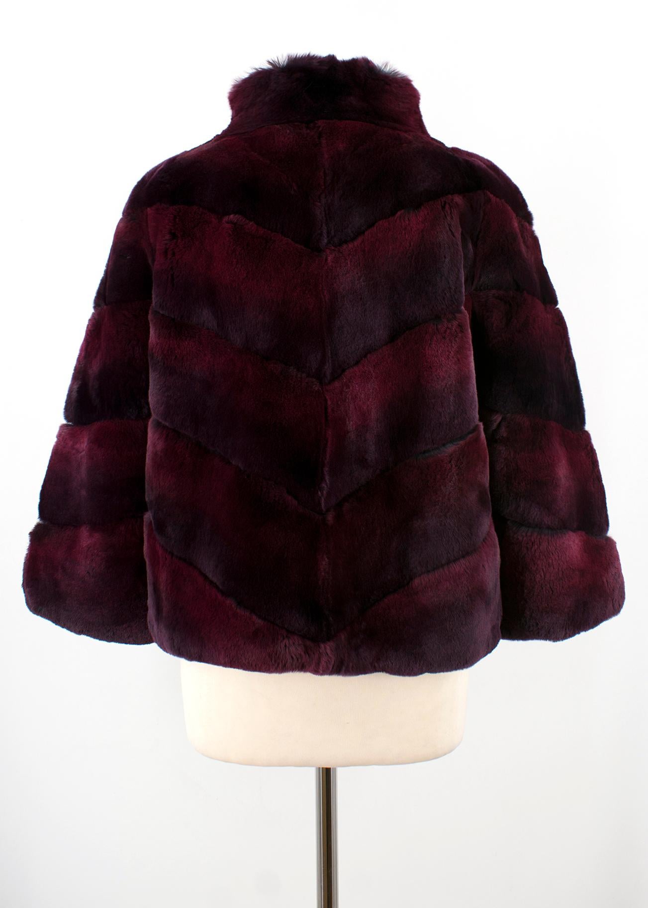 Diane von Furstenberg Purple Rabbit Fur Coat

- 100% dyed rex rabbit fur
- High collar  
- Polyester lining 
- Four hook closures 
- Inside label with security features is a certificate of authenticity 

Sizing:
US 6. Size Small. UK 10.
Approx.