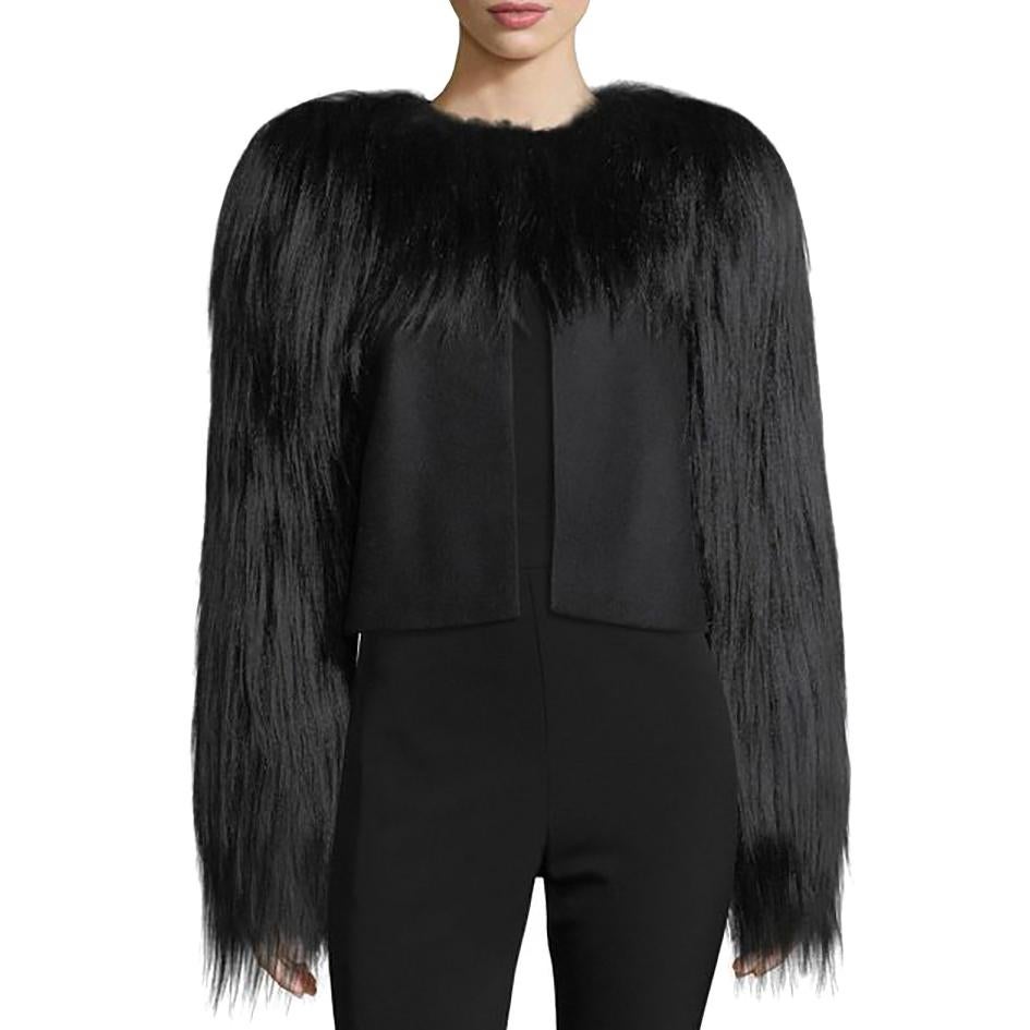 Bottega Veneta Fur-Trim Wool Jacket

- Wool jacket with dyed goat hair fur trim around neckline and covering sleeves
- Round neckline and semi-open front
- Long sleeves
- Strong shoulders
- Boxy silhouette

Sizing:
Italian size 36
US