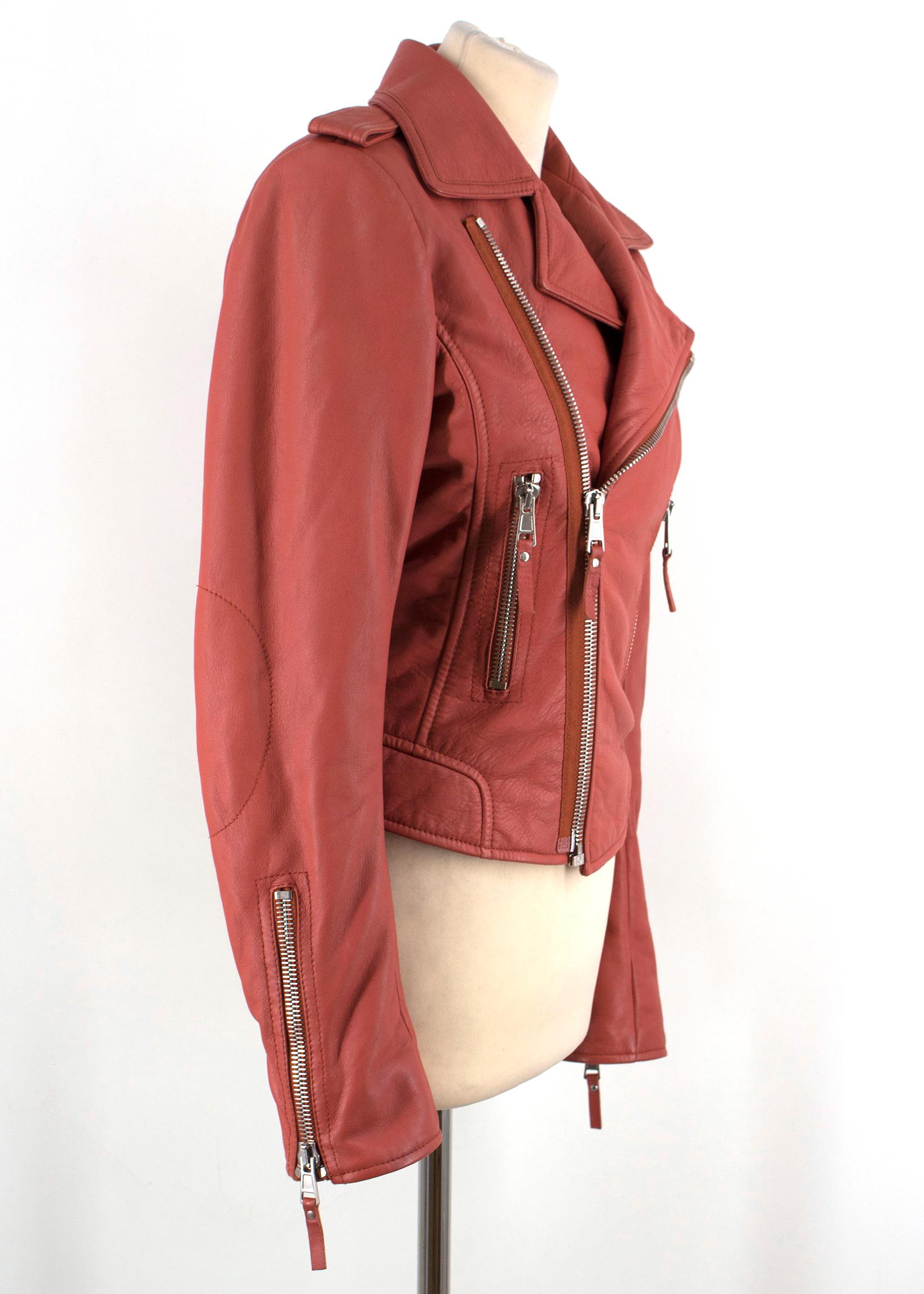 Balenciaga Red Leather Jacket

- Red lambs leather jacket with silver tone hardware
-Epaulettes with silver tone hardware
-Silver tone zips on cuffs
-Black lining

Sizing:
US 4
XS
Italian 40
Approx.
Length - 56cm
Shoulder width - 40cm
Sleeve length