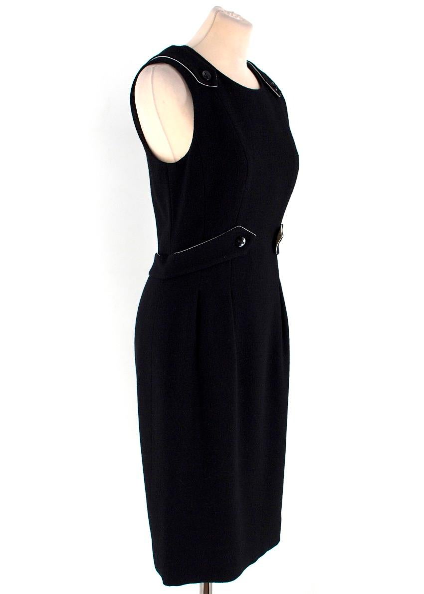 Chanel Vintage Black Buckle Embellished Wool Dress 

-Black sleeveless knee length dress
-Button strap details on shoulders and waistband
-Tailored around bust and waist
-Back zip closure

Please note, these items are pre-owned and may show signs of