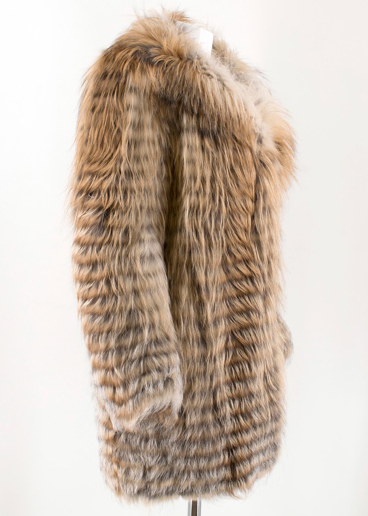 Celine Fox Fur Coat

- Lightweight coat made out of natural striped fox fur
- Lined with brown silk
- Hook & eye fastening
- Foldover collar


Postage is set to cover insurance and will be confirmed upon sale. Please contact admin if you have any
