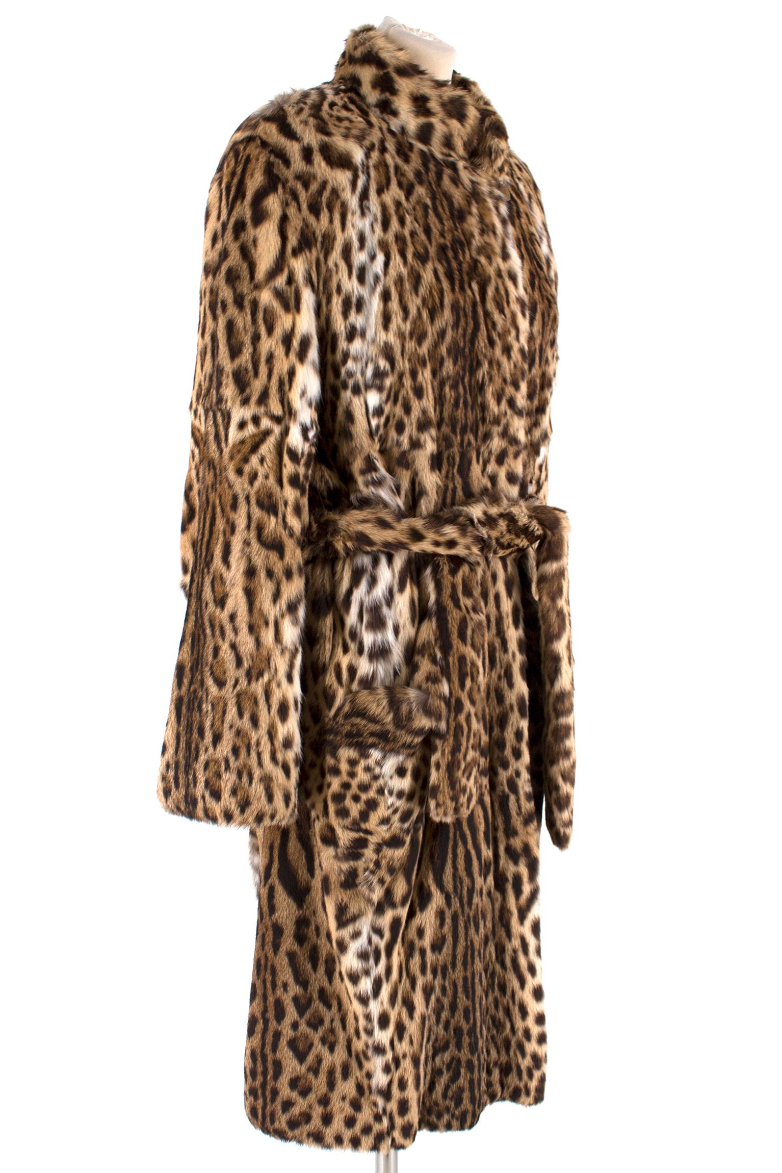 Annabella Pavia Lipicat Fur Coat

-Full length lined lipicat fur coat
-Button and hook and eye closure
-Two front pockets
-Features belt with bow tie closure
-Shoulder pads

Please note, these items are pre-owned and may show signs of being stored