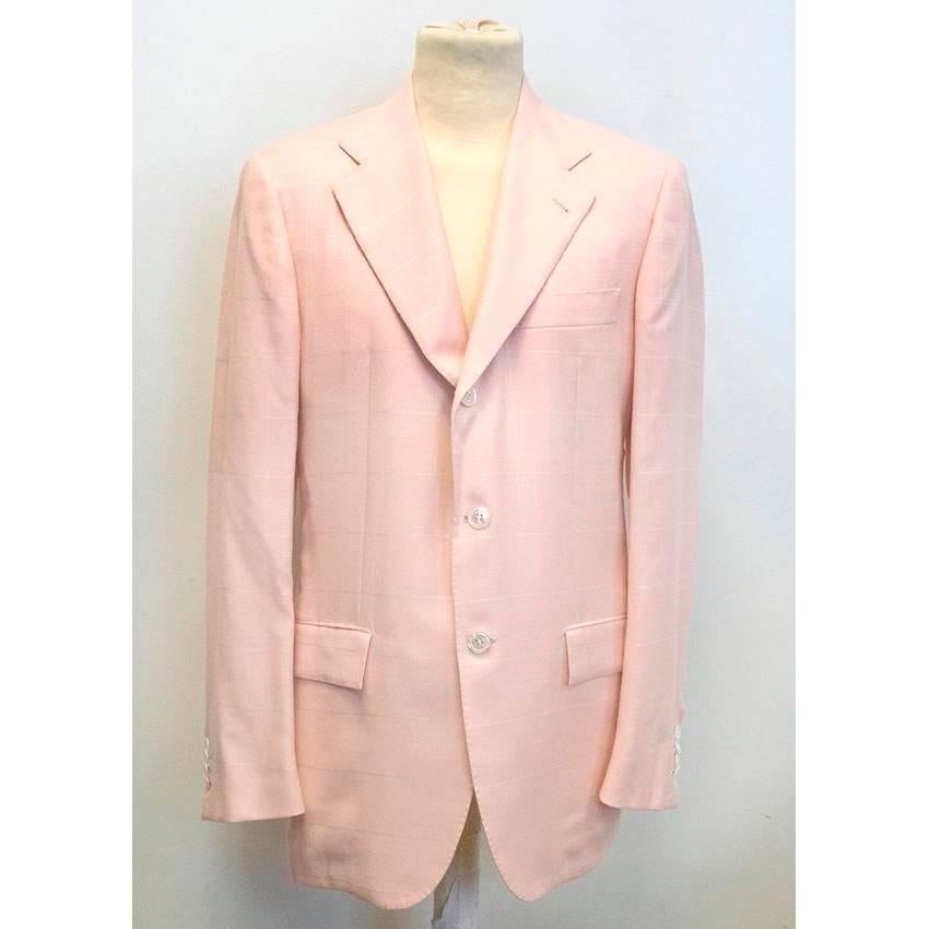 Kiton pastel pink cashmere blazer featuring a large checked pattern in white with white mother of pearl style buttons, notch lapels and three functioning pockets. The blazer is lightweight and fully lined with a classic fit. Made in Italy. Size 48 /