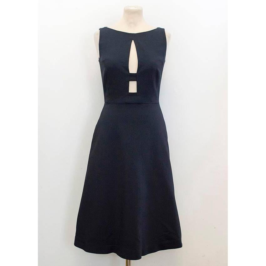 Osman navy sleeveless midi dress with a bateau neckline, concealed back zipper and cut-out detail on the bust. The dress is made from heavyweight crepe and is fitted to the body with a flared skirt.

Made in England. Perfect condition,