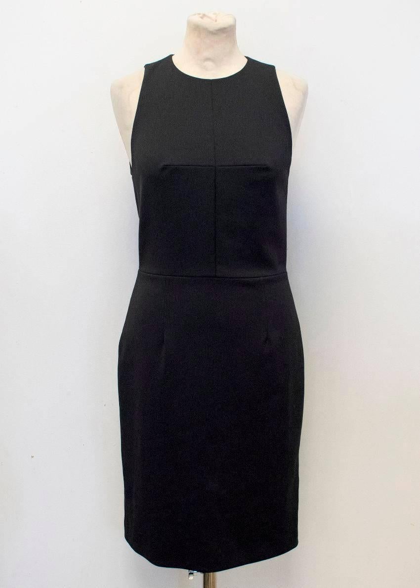 Alexander Wang black tailored knee-length dress with cut out details on the back and a high-neck. 

Condition: 10/10

Fabric- 94% Nylon,6% Elastane

Approx measurements:
Length: 95 Cm 
Waist: 35 Cm 
Bust: 43 Cm 
Hips: 46 Cm

UK size 10
US size