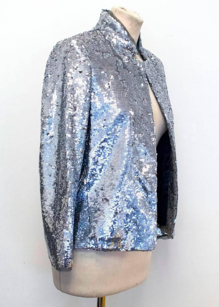 Zadig and Voltaire sequinned silver blazer with a notched lapel and one vent. Fully lined and loose fitted. 

Approx measurements:
Length: 56 Cm 
Sleeves: 53 Cm 
Shoulders: 38 Cm

UK size S
US size 10

The mannequin is a UK size 8-10 and US size
