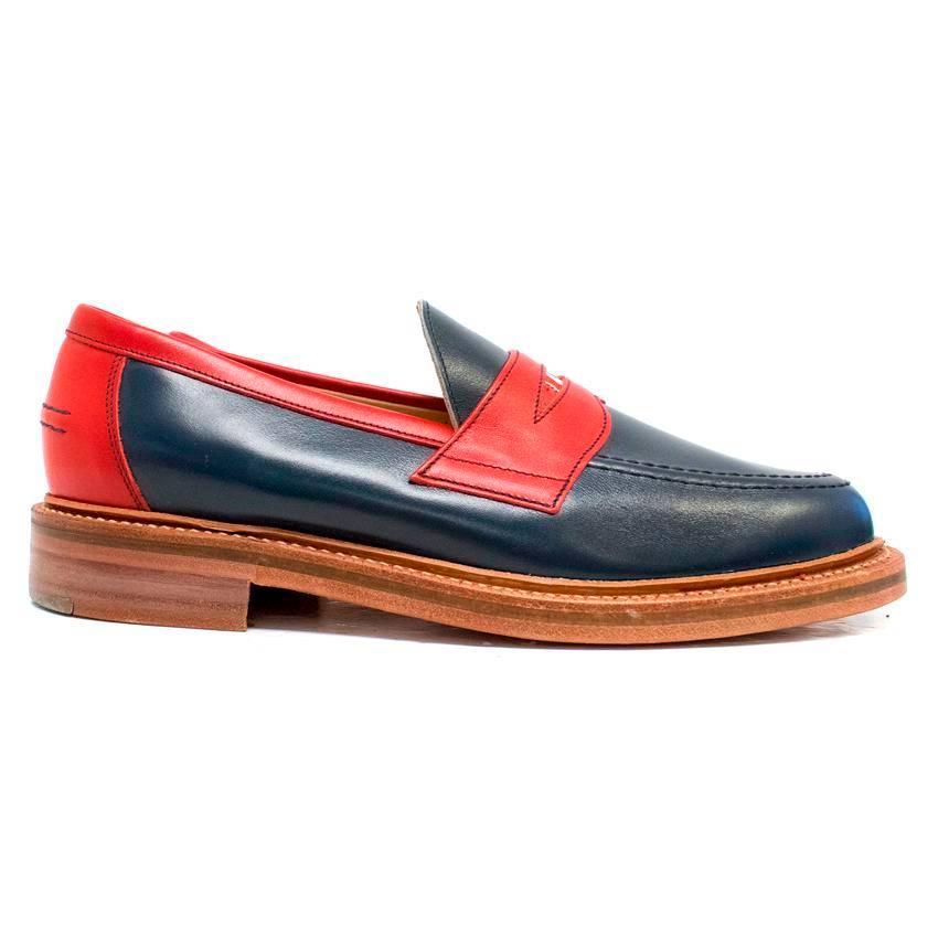 Thom Browne red, navy and white leather loafers with wooden soles and decorative stitching. 
Lined with nude leather. 

Condition: the shoes are brand new and never worn, however there are minor marks on the lining and soles, 6 and