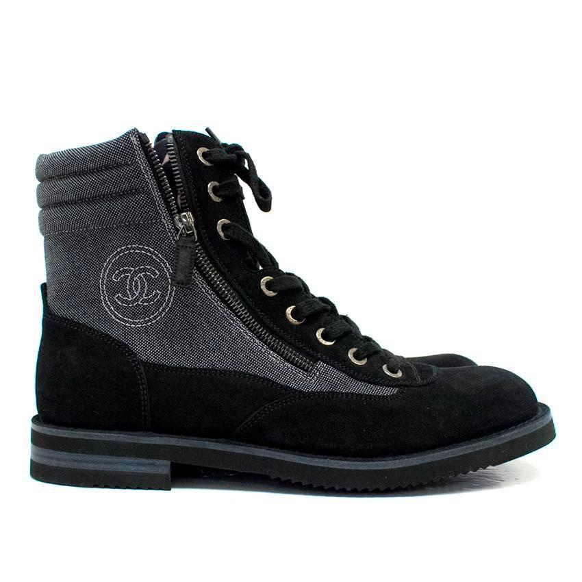 Chanel grey high top boots with black suede trims, two metal zips and rubber soles.
Feature black laces and metal eyelets. 
Lined with black leather. 

Condition:10/10 

Approximate measurements: 
Length: 31.5 Cm 
Height: 18 Cm 
Width: 11 Cm

UK