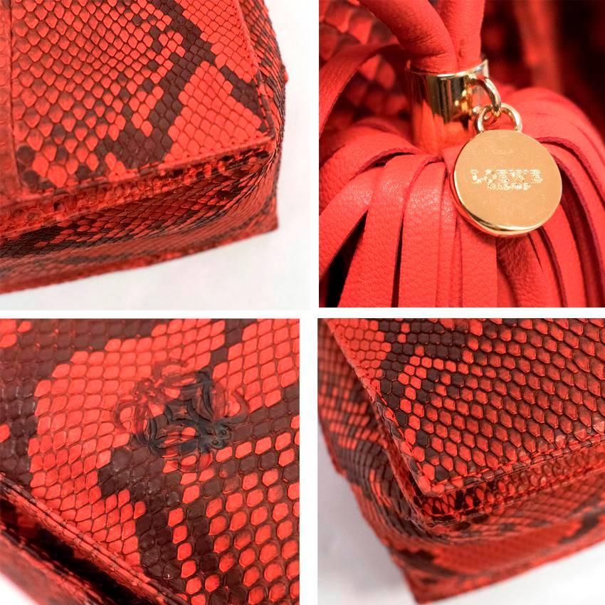 red snake skin bag