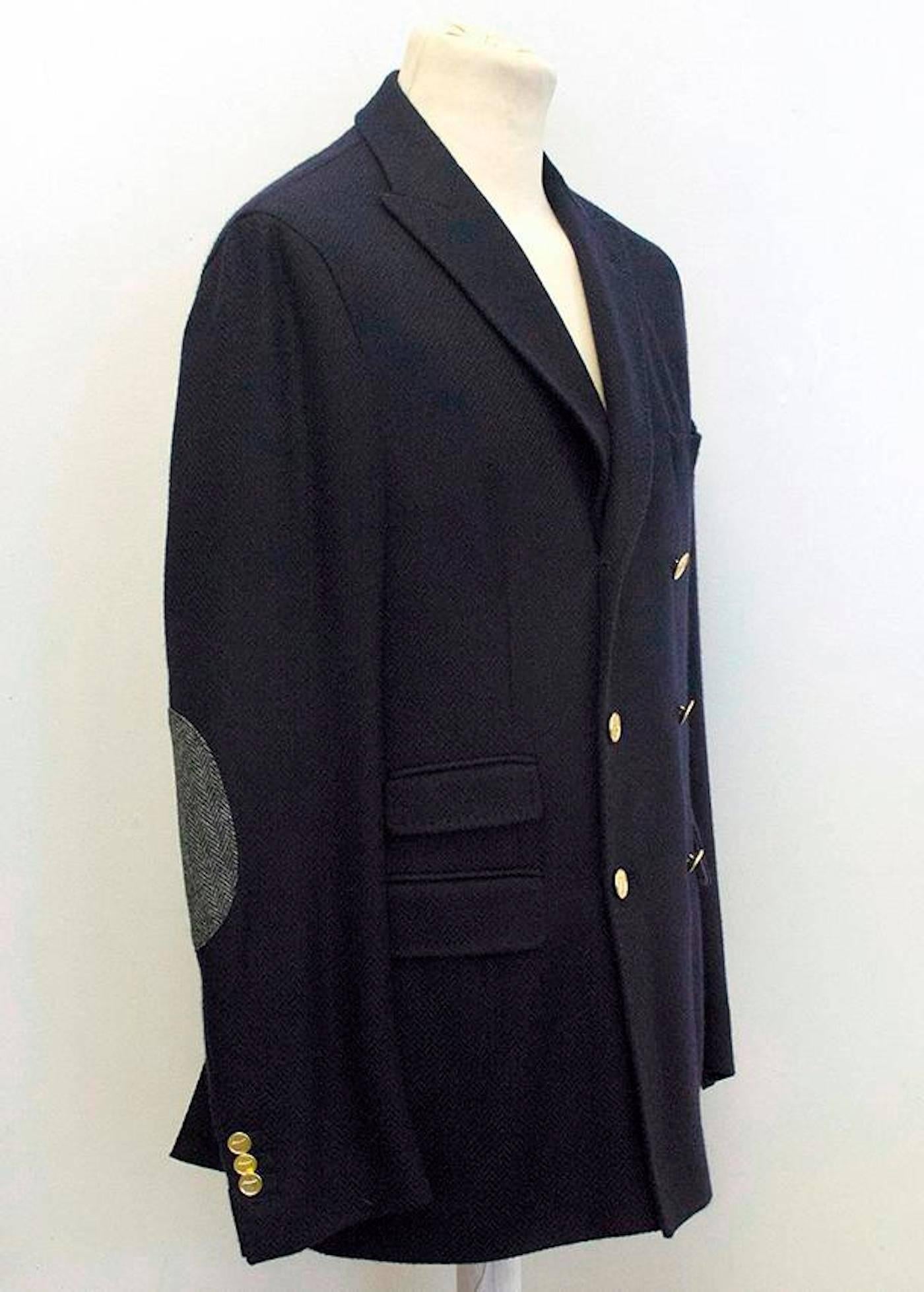 Wool and cashmere blend navy blazer with gold buttons. 

New without tags in perfect condition 10/10. 

Approx. 
66cm Sleeve 
78cm Length 
48cm Shoulder
54cm Chest

US size XL