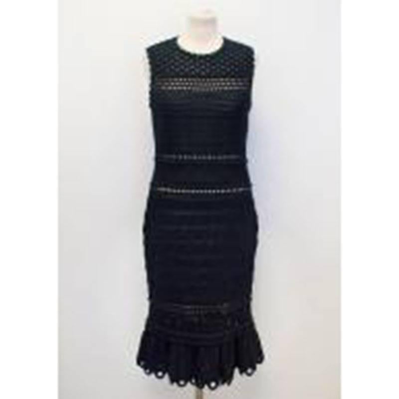 Alexander McQueen black crotchet, sleeveless midi dress with a scalloped scoop neckline and cuffs. Features a frill hem with eyelet details. Lined with nude silk. 

Conditions Details : There are minor marks on the lining, please see image
