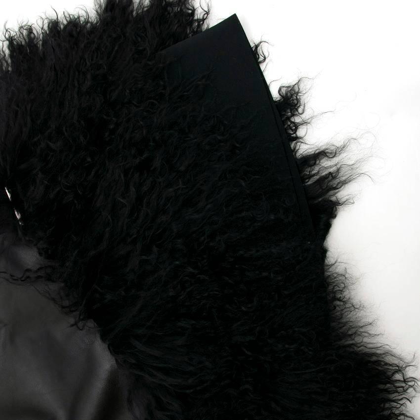 David Koma black leather and fur dress. 
V- cut overlap leather and mongolian asymmetric hem dress. 
Made in UK. 

Approx: Chest- 42cm Shoulder-10cm Waist- 36cm Length- 75cm

UK Size: Size S/Size 10 
US Size: 6 