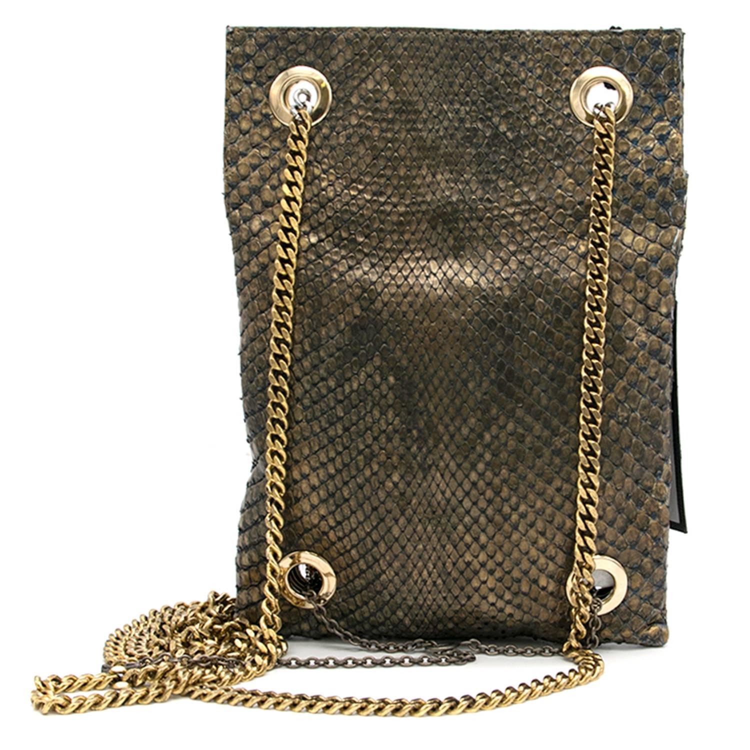 Balmain ambre sac python bag with snake pattern and in a paper bag style with chain detail on bottom of bag, tassel detailing towards the top of the bag and gold chain strap.

Fabric: 45% Cotton/45% Poluamid/ 45% PU

Approx Measurements: Length-