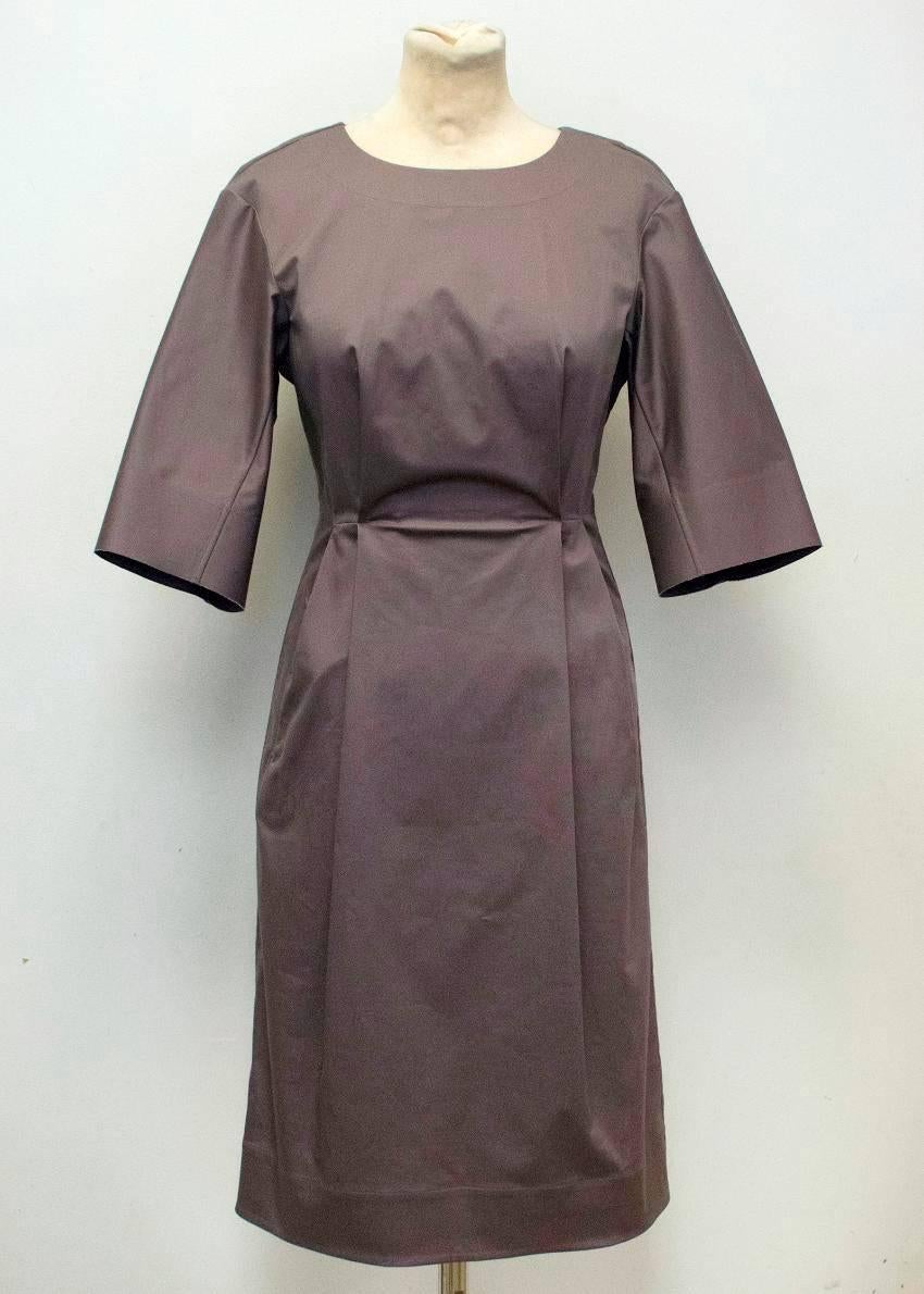 Jil Sander charcoal midi sheath style dress. It features three quarter length sleeves, a scoop neckline and two front pockets.

Condition: 10/10

Fabric: 97% Cotton 3% Elastane

Approx Measurements: Length: 100cm, Shoulders: 44cm, Bust: 31cm, Waist: