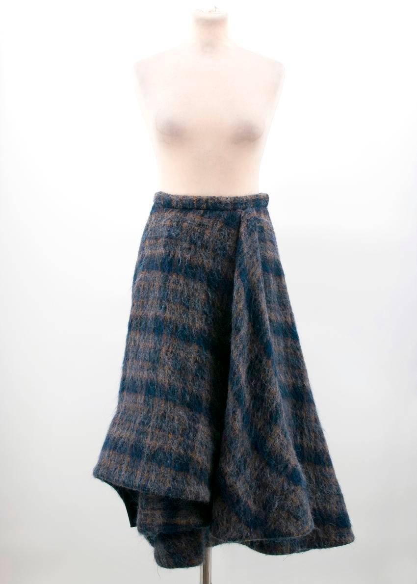 Brock Collection blue check skirt. Heavyweight layered A-line wool skirt with silk lining. features concealed side zip.

Conditions Details : Condition - 9.5/10 

Fabric: 22% Alpaca, 22% Mohair, 20% Polyamide, 19% Virgin

Approx Measurements: Waist: