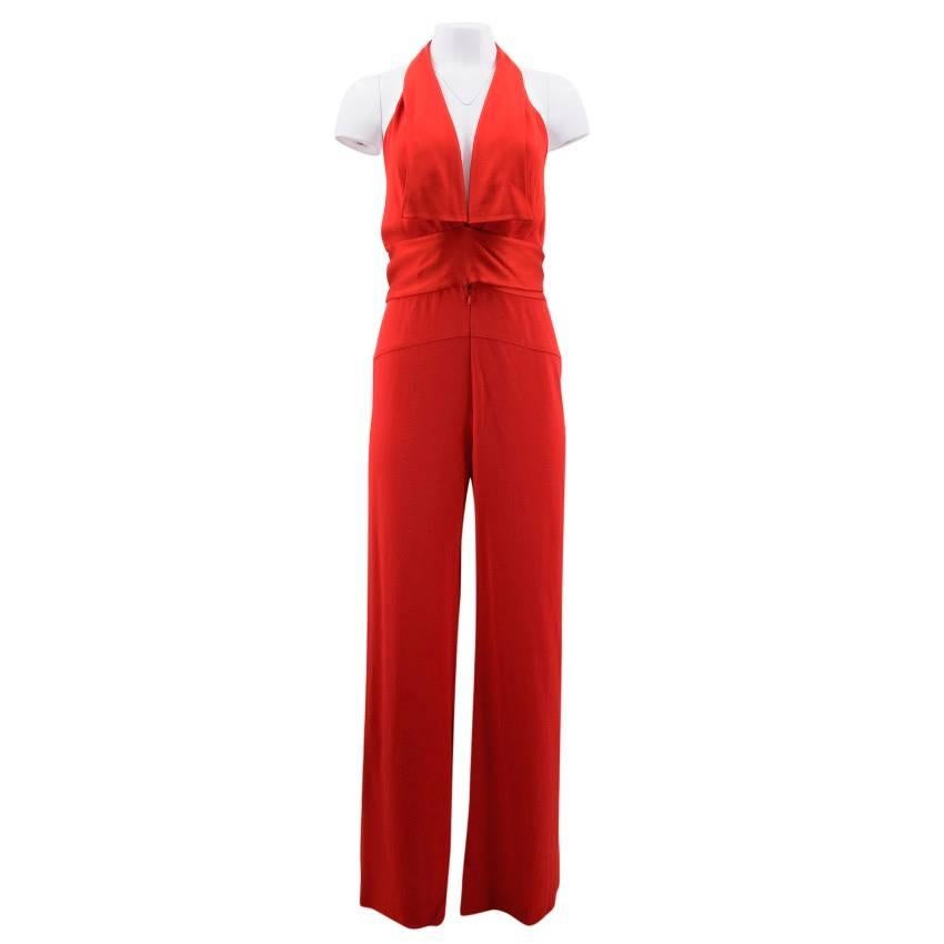 Maria Grachvogel red halter neck jumpsuit with v neck line, open back, wide leg, ribbon tie around waist and concealed zip and hook and eye closure. 

Conditions Details : 9.5/10

UK Size: Size: S, Label Details: 10
US Size: Size S, Size 6 
