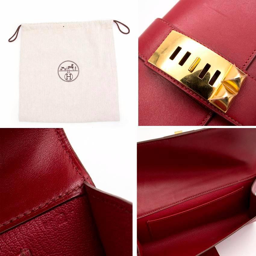 Hermes sanguine red permabrass medor clutch. 
Made in France. 

The plastic is still on the hardware apart from one stud. 
Features an interior pouch pocket. 

Fabric: Box Leather. Hardware: Permabrass. 

Size: One Size/Small. 

Approx Measurements: