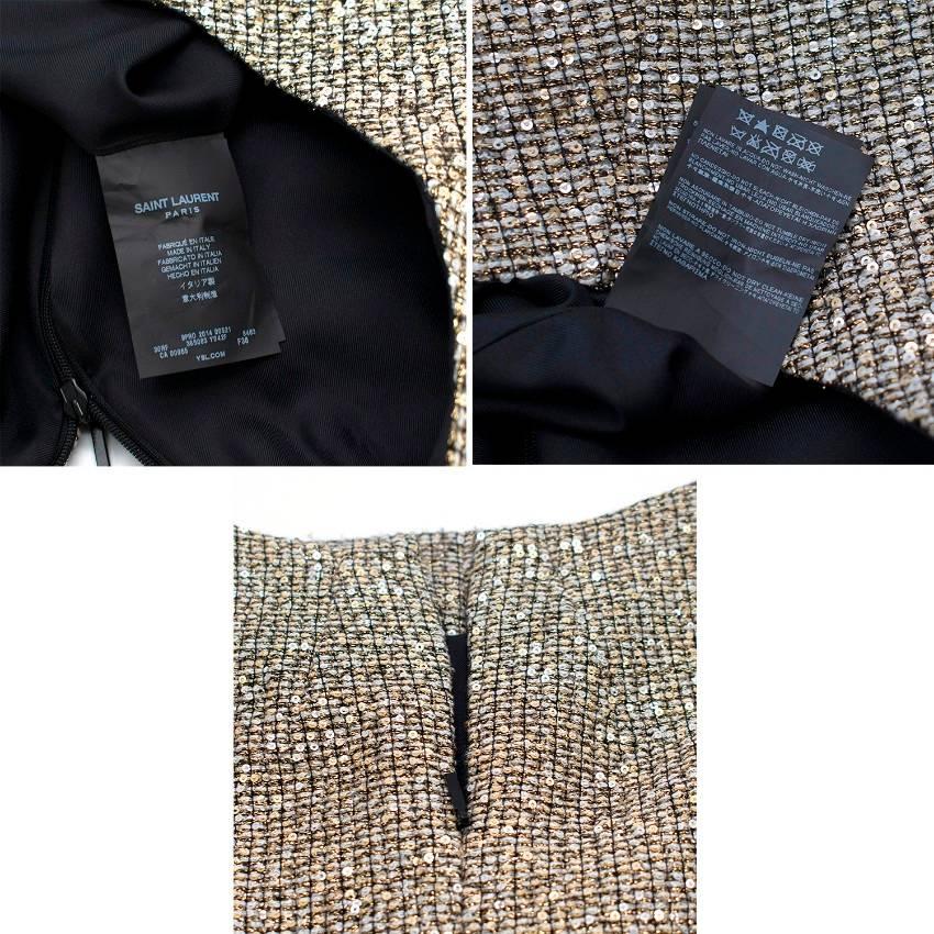 Saint Laurent Gold Tweed Shift Dress

- Gold in colour
- Tweed design fully embellished with sequins
- Black 100% silk lining
- Concealed back zipper with hook and eye closure
- Saint Laurent Paris and gold chain sewn inside the back
- Sleeveless
-