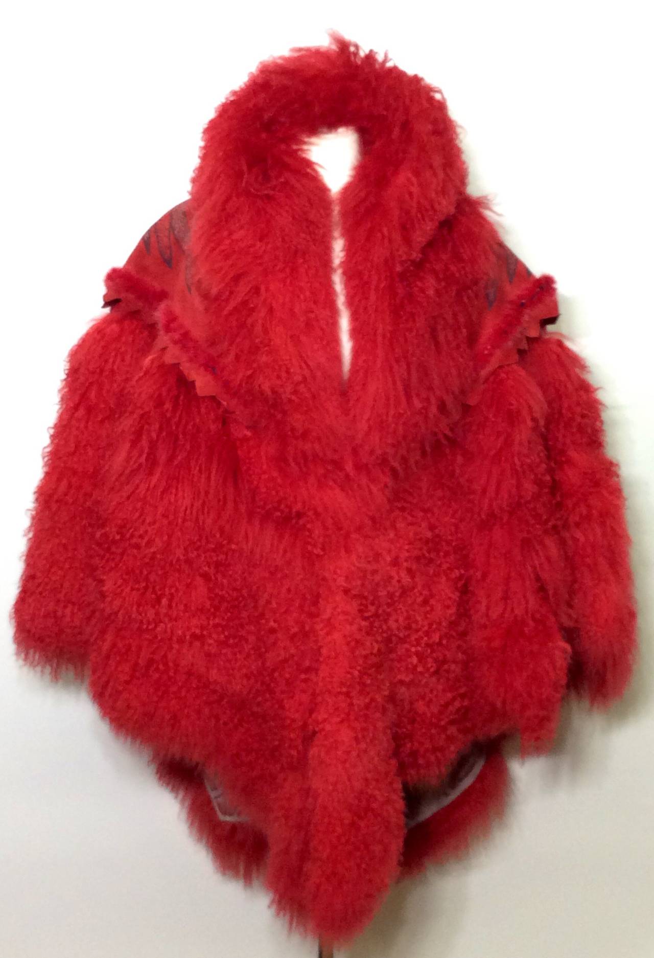 This is an incredible one-of-a-kind 1986 vintage Zandra Rhodes fur for Philip Hockley. Limited hand painted reversible red cape cloak for Nieman Marcus.
Please email for additional images or details..