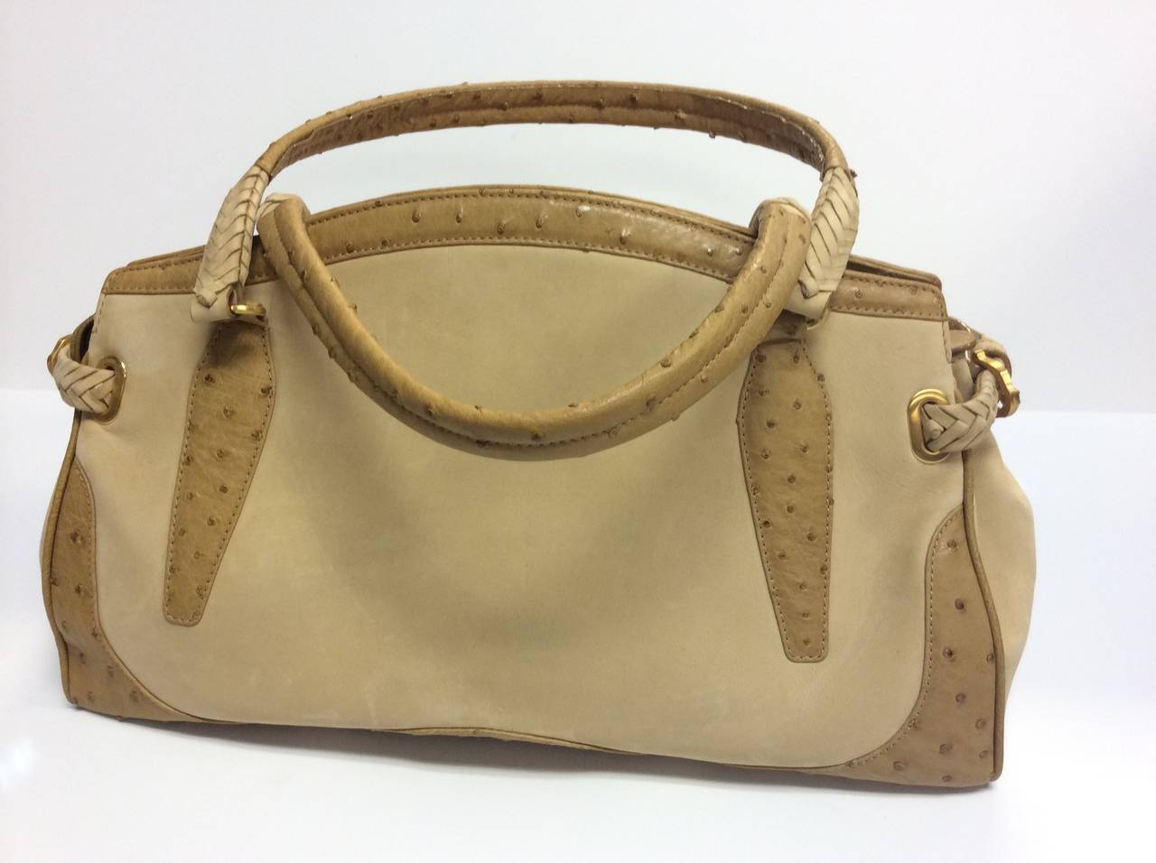 This is a new Cece Cord tan soft sand ostrich trim nubuck suede tote. New condition.  $3200