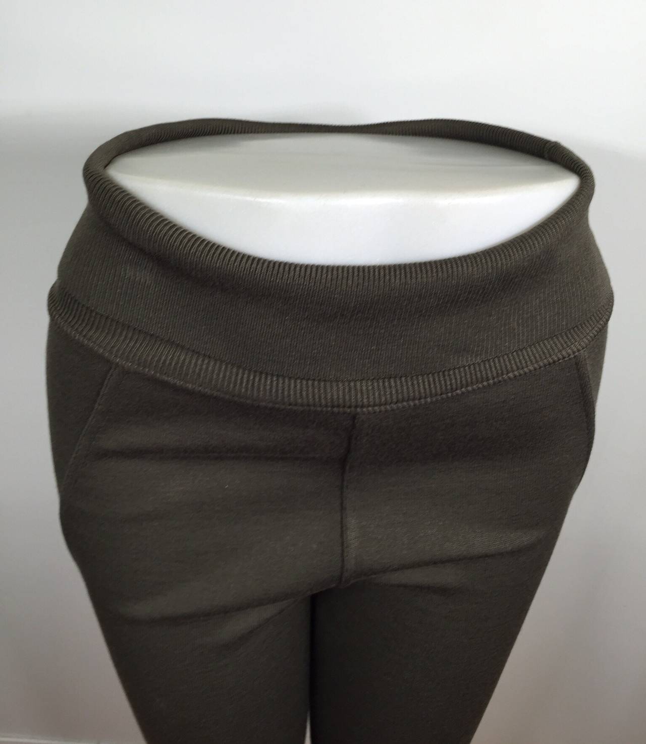 This is a vintage pair of Alaia olive wool leggings with fold over waist 
Size XS 
Made in Italy
Composition 80% wool 5% elastin 5% polymeade
Measurements:
Inseam  27