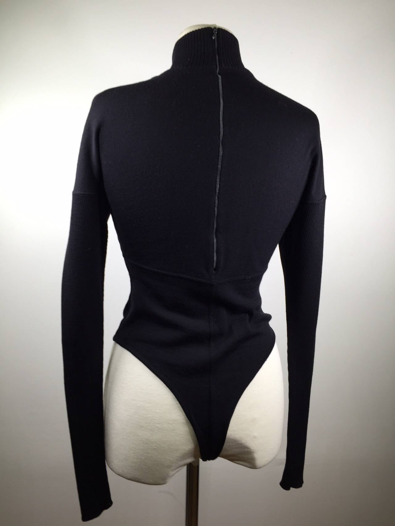 This is a rare Alaia wool black thong bodysuit. 
Measurements:
Bust 34