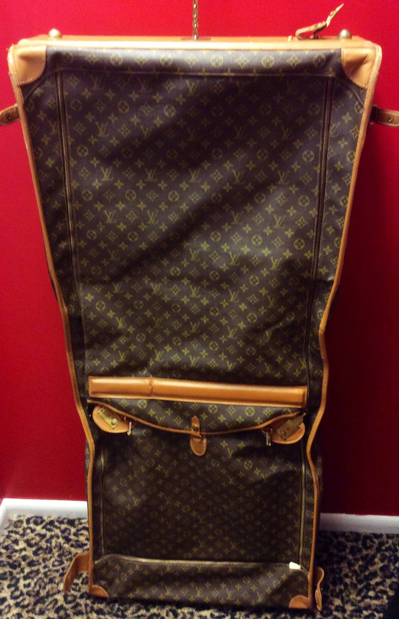 This is a vintage Louis Vuitton French Company for Saks Fifth Avenue monogram large garment bag
Zip shoe compartment. 
Measurements: approximately
51