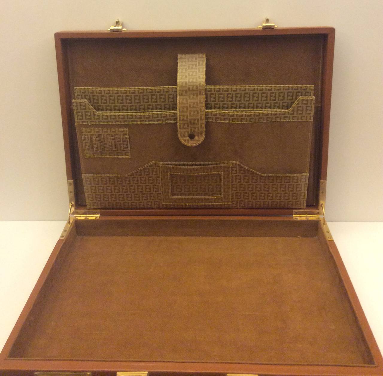 This is a rare vintage Fendi monogram briefcase
Measurements:
17