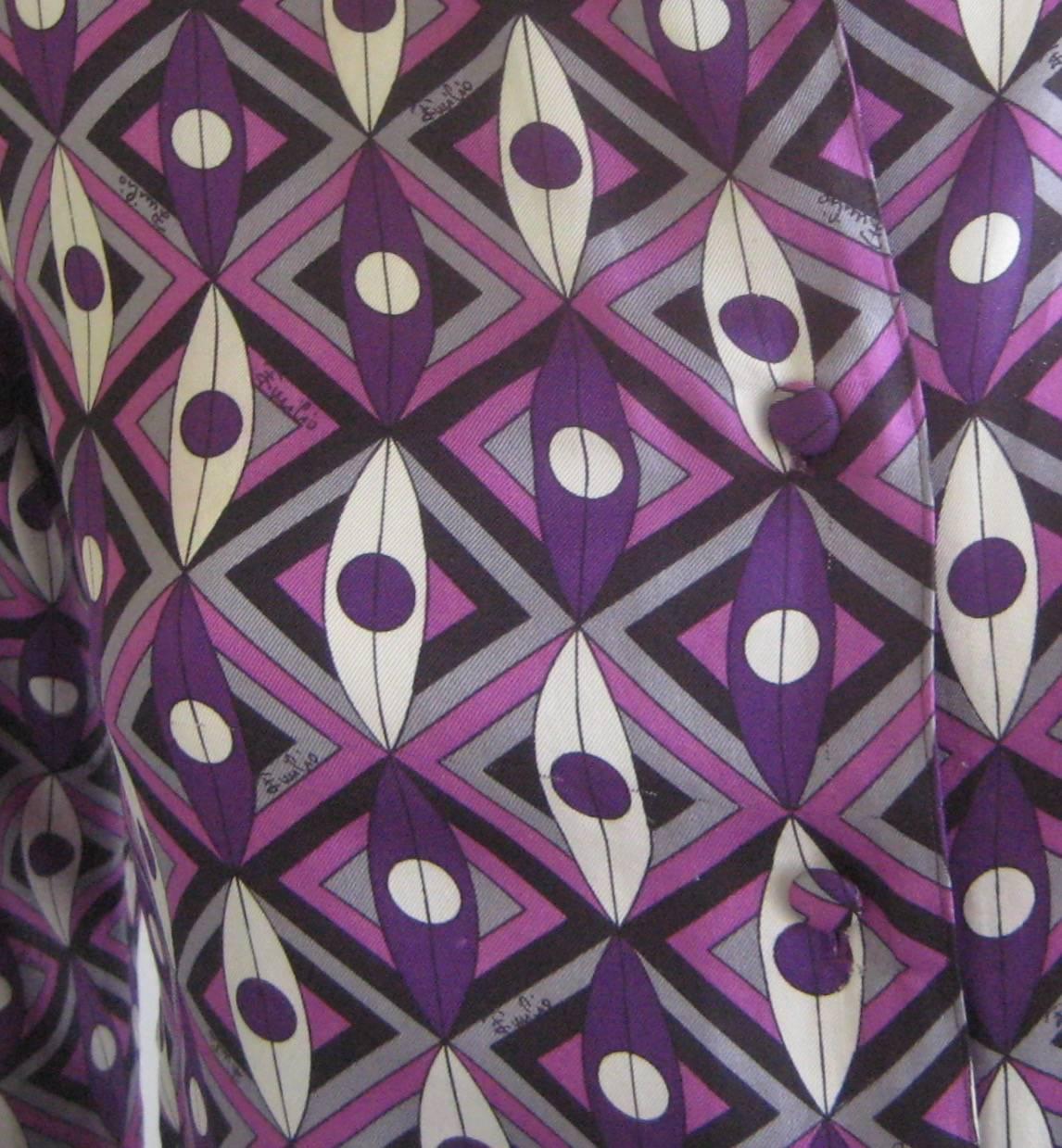 Lovely PUCCI silk blouse 
Silk covered buttons down the front
Gorgeous colors 
Excellent condition
This measures 36