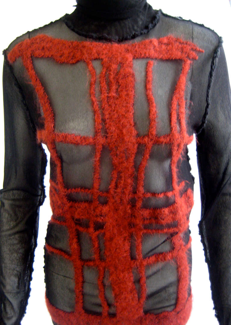 Maille Homme top is suitable for men and women and is shown on a size 6 mannequin.
Black net interwoven with mohair chenille