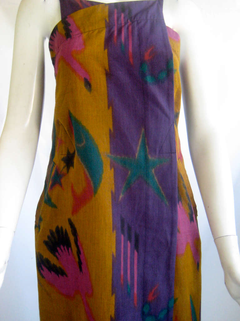 Wonderful early miyake wrap dress
Cotton sheath with wrap around overlay
Gorgeous print of moon, stars and sea creatures.
No closures .This just slips on over the head 
2 side pockets
Exceptional condition.Looks unworn 
Matching jacket