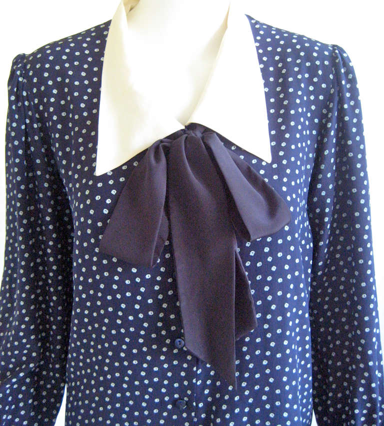Lovely polka dot YSL blouse
100%silk
White collar and cuffs
Attached silk ties at neck