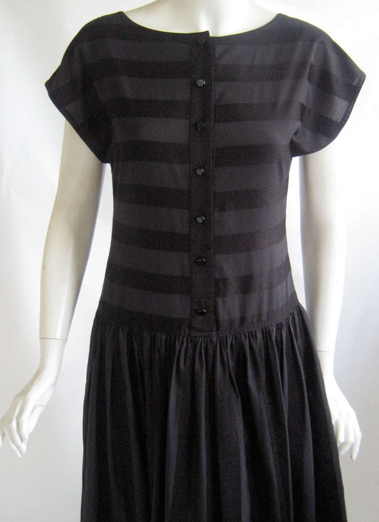 Lovely summer dress
100% cotton
Striped black on black 
Full skirt 
Buttons down the front