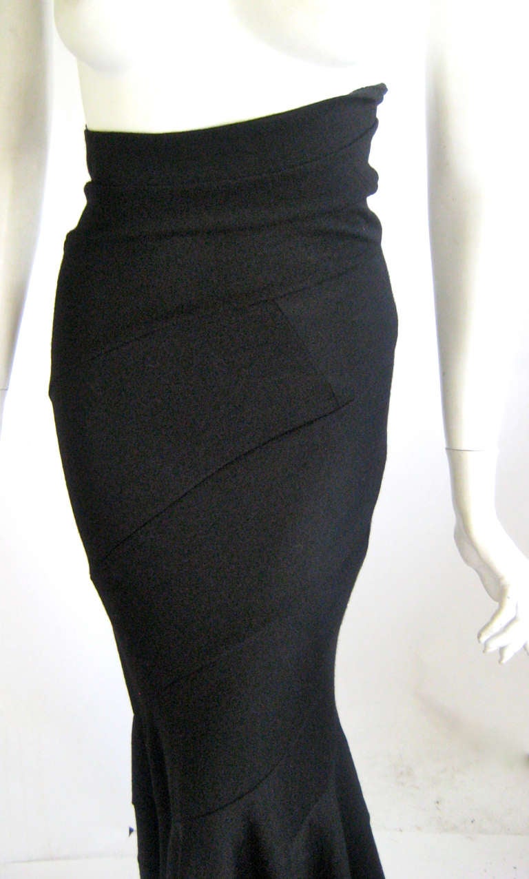 100 % wool 
Bias cut swirk panels 
High waist