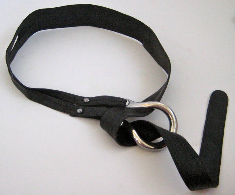 Elsa Peretti for Halston 
Large sterling horseshoe buckle
4 interchagable leather belts fasten with sterling studs marked Peretti Tiffany and Co 
All leather belts are stamped Tiffany made in Spain
The blue and rust belts look unworn as does the