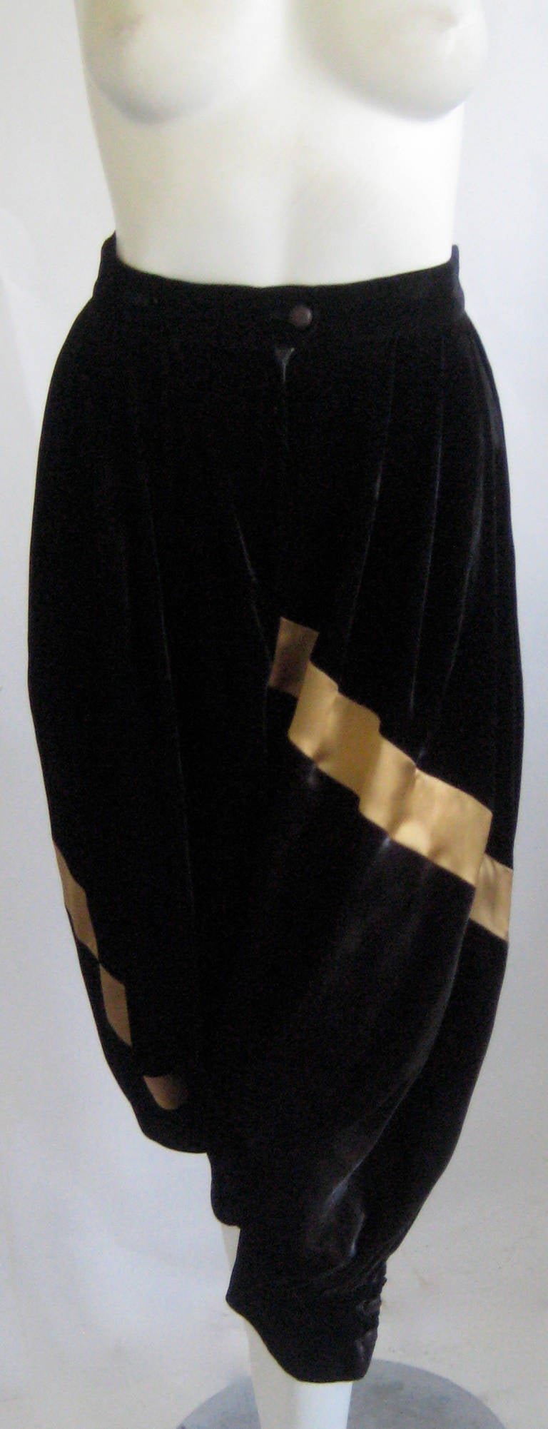 Krizia drop crotch harem pants 
Black rayon velvet banded with gold rayon silk 
High waist
Each cuff has 2 buttons
2 hidden side pockets