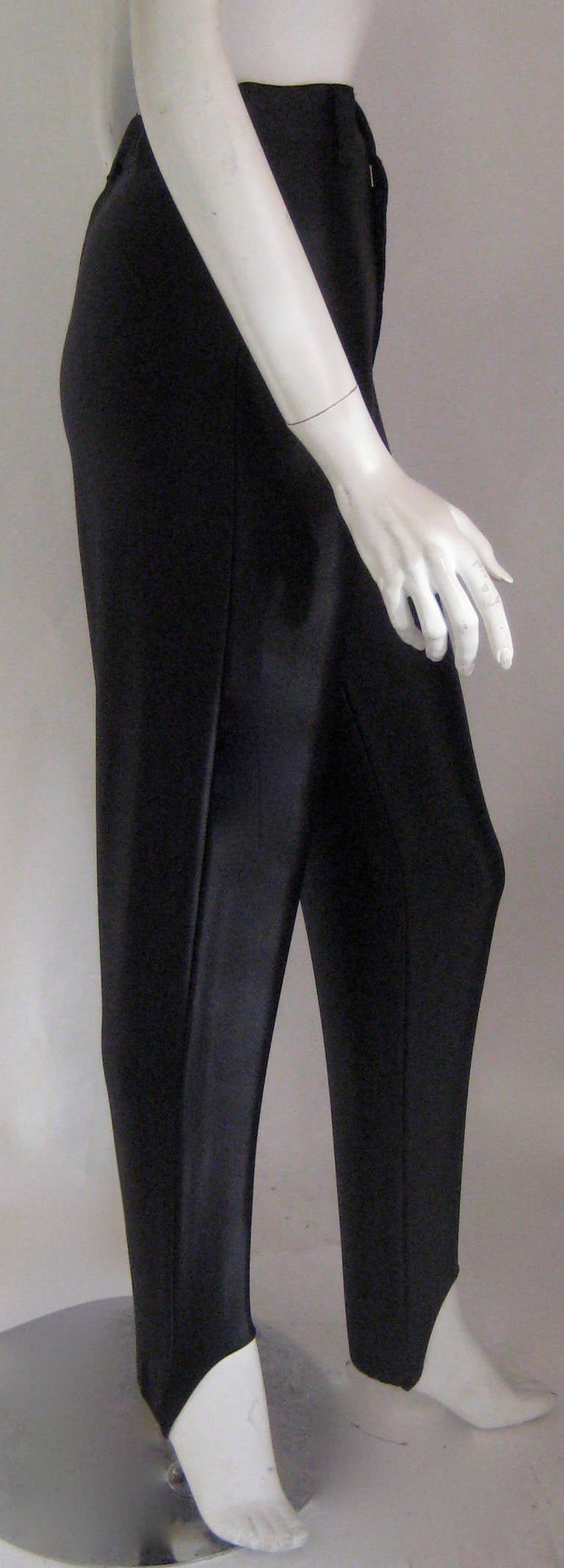 From the Ebony Fashion Fair Runway Archive Collection
High waisted pants
Snap waistband
These can hook over the heel or be worn scrunched up
Fabric is a combination of nylon and polyurethane