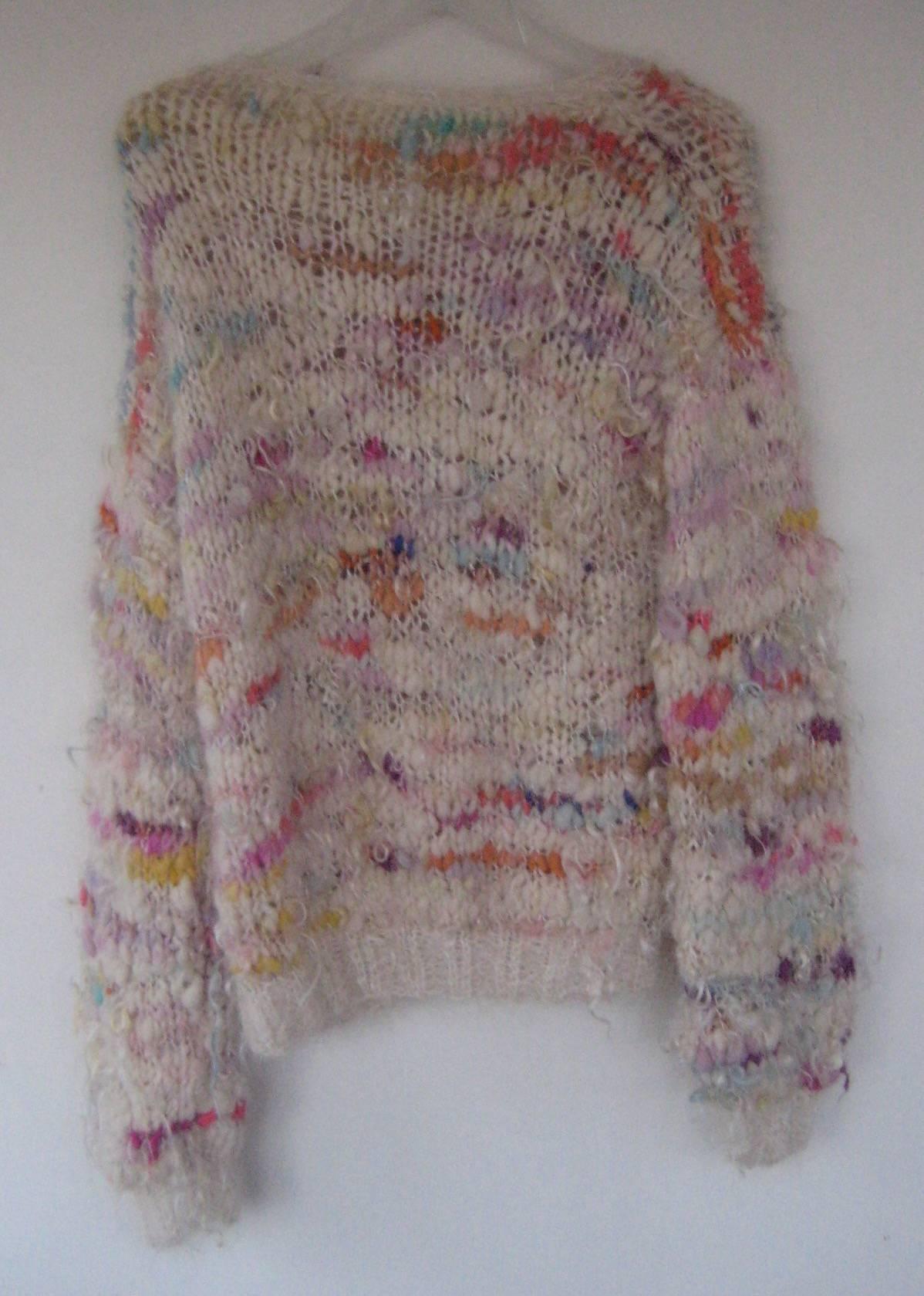 Incredible 1970s punk rock sweater
Hand knit in soft pastel hues
Wool and mohair
Excellent condition , looks unworn
