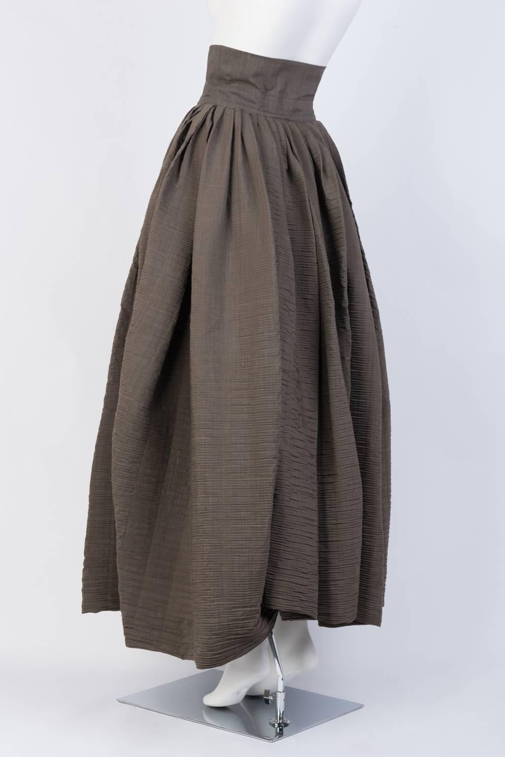 Voluminous, pleated Maxi skirt, unlined, with high, wide 3 button waistband.