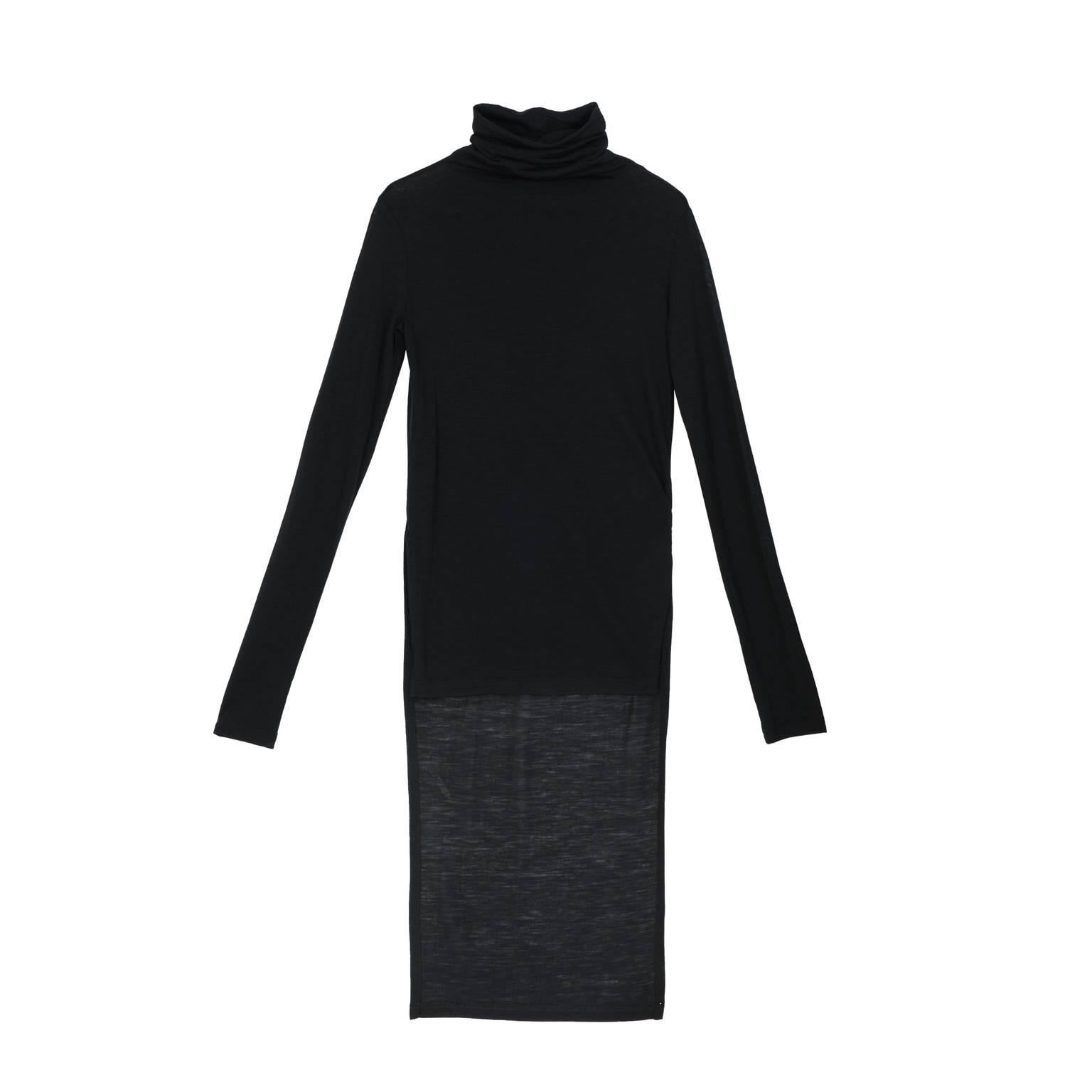 Longsleeve turtleneck pullover in lightweight knit with knee length back panel