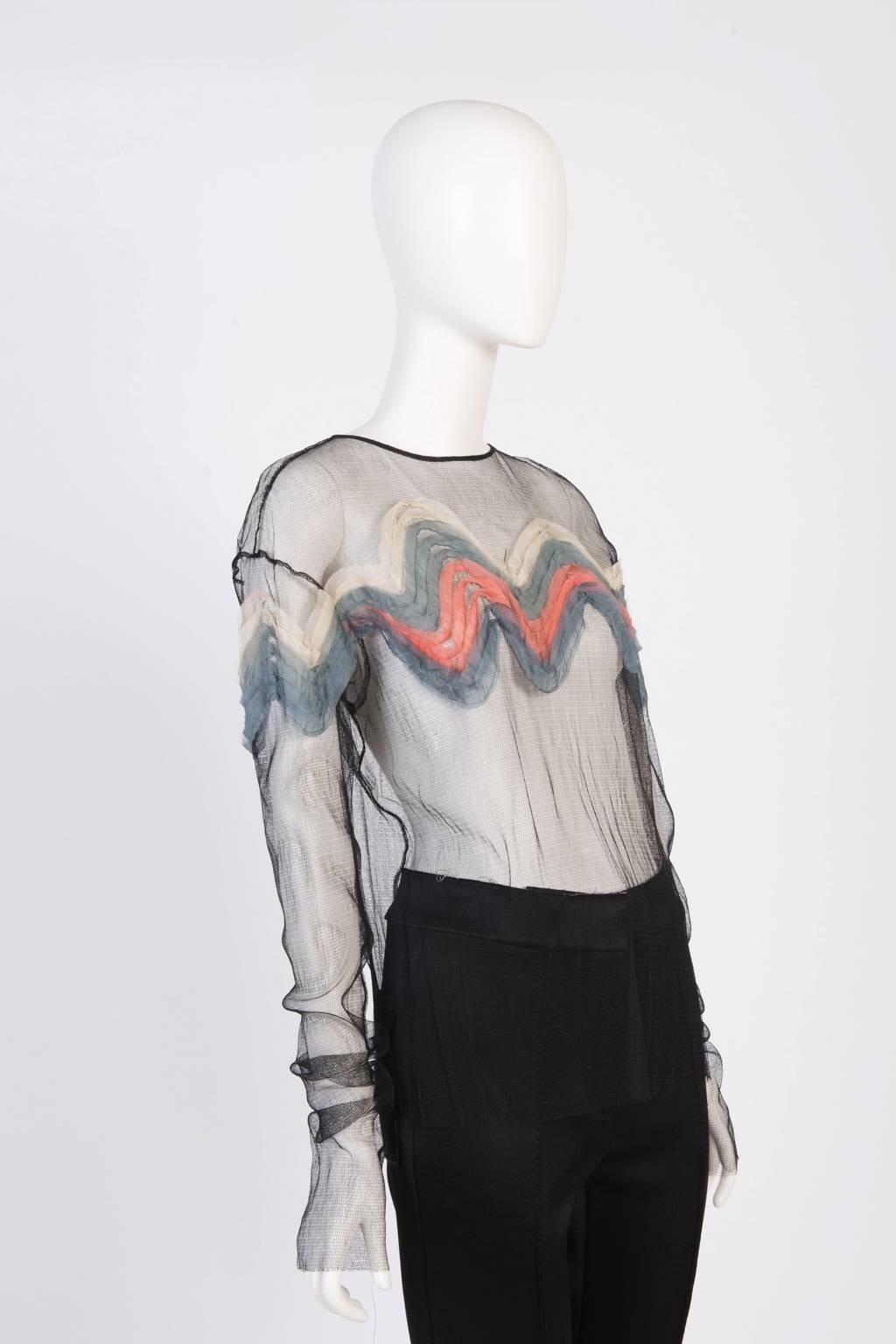 Mesh top with hand pleated silk wave pattern.