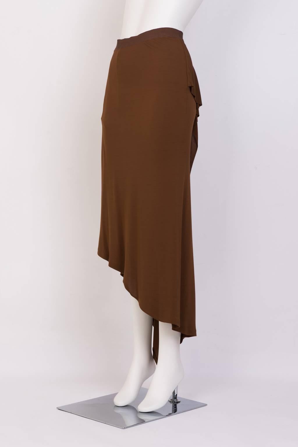 Wrapped & Draped, crepe skirt with asymmetrical cut and back slit.