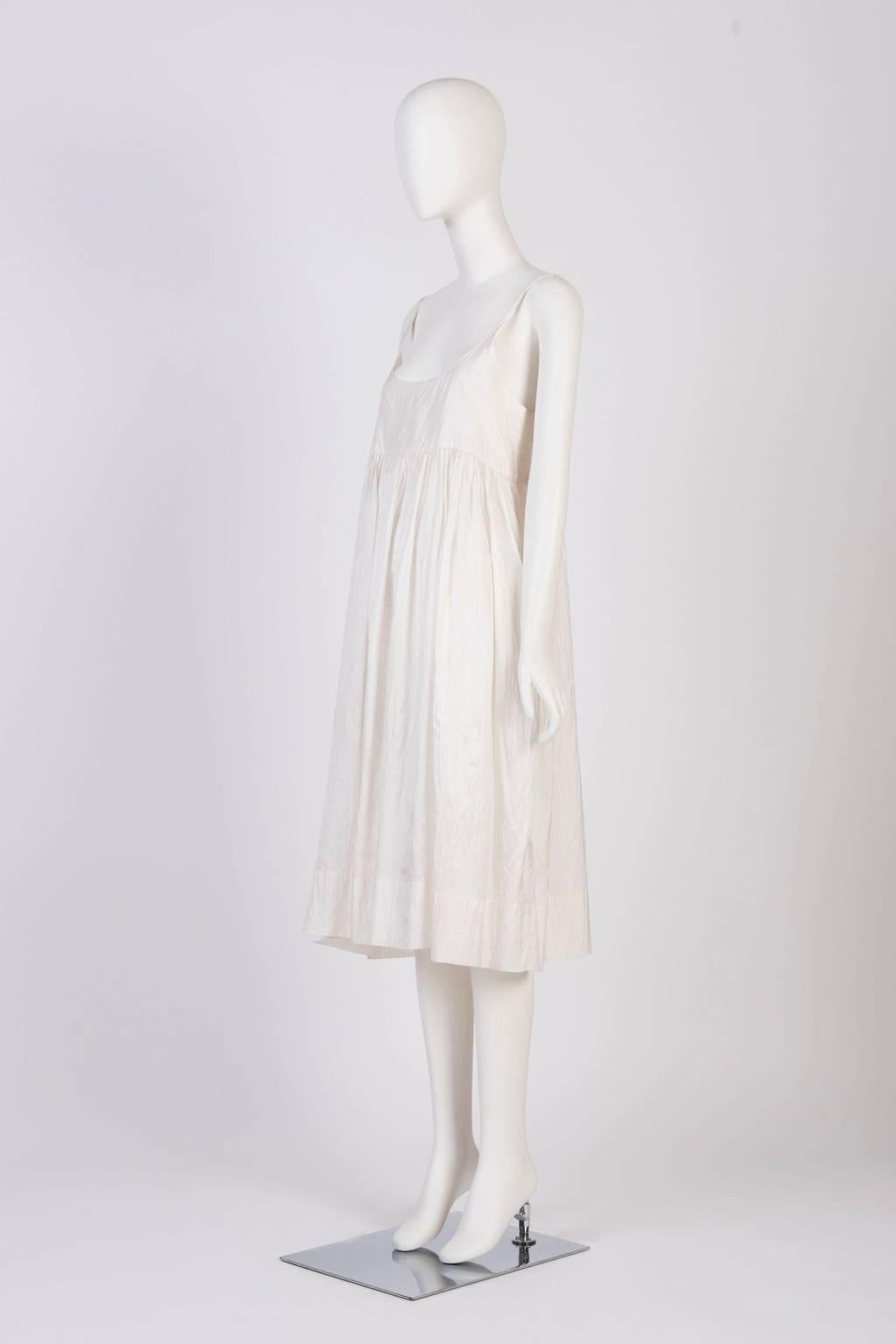 Loose fit Injiri dress with thin straps in semi-sheer crushed silk.