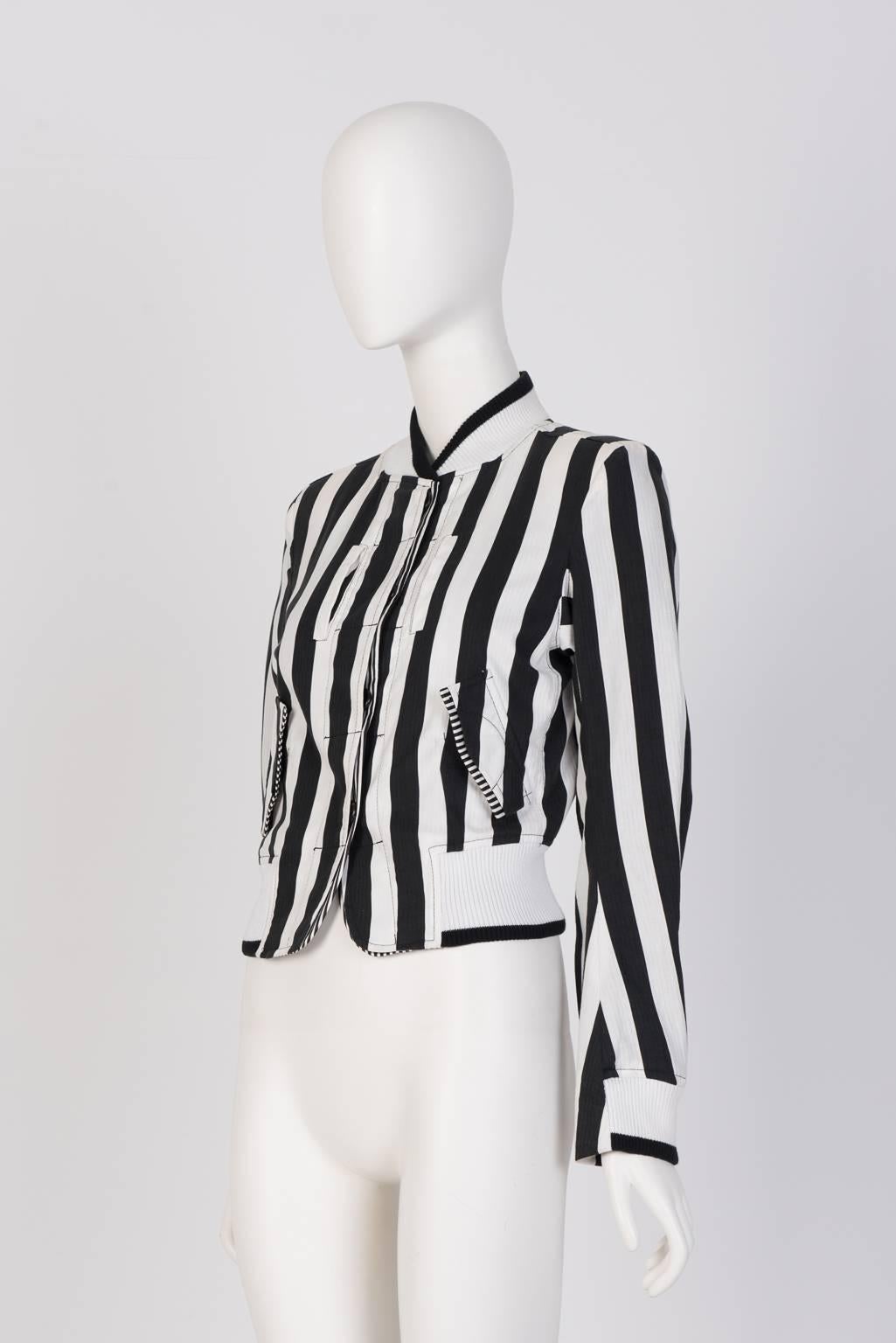 Ann Demeulemeester stripe cotton bomber jacket with silk stripe lining panels at pockets and botton closure. Knitted collar, cuff and hem. 