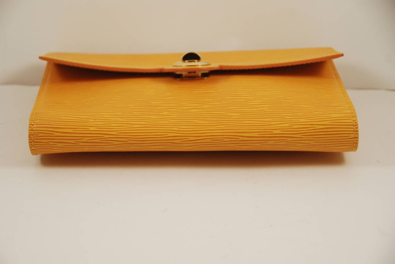 Louis Vuitton Mustard Yellow Epi Leather Arche Clutch 1